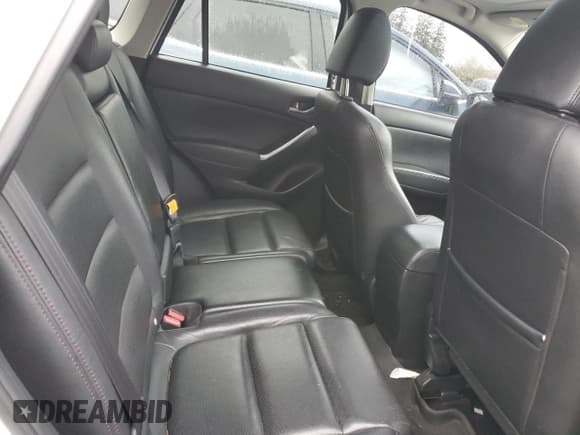 ✅ 2016 Mazda CX-5 Grand Touring • VIN: JM3KE4DY1G0803211 • Лот: 89537495. Опубликован ранее на Copart с пробегом 255 646 миль. Бесплатный доступ к архиву аукционных продаж из США и подробный отчёт об истории автомобиля на DreamBid. Изображение 11.