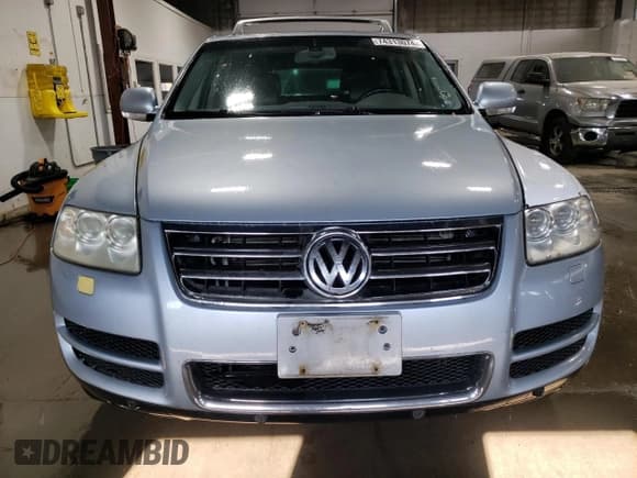 ✅ 2004 Volkswagen Touareg • VIN: WVGCM77LX4D073865 • Lot: 74313074. Listed on Copart with 186,911 mi. Free auction sales archive from the USA and detailed vehicle history report at DreamBid. Image 5.