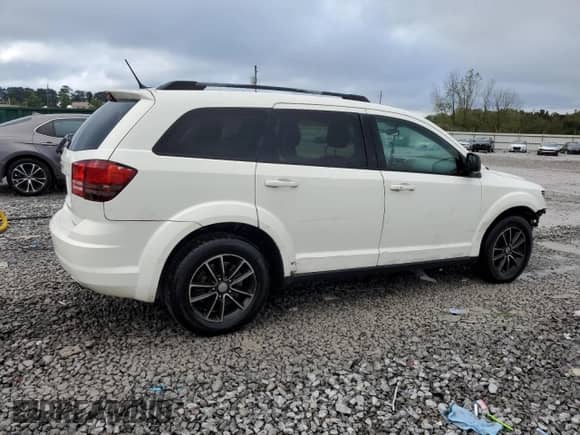 2017 Dodge Journey SE with VIN 3C4PDCAB8HT622011, listed as a Copart auction lot 85518895 with 121,368 mi miles and Salvage title. Bid and sale history available at DreamBid. Image 3.