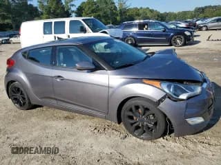 ✅ 2013 Hyundai Veloster w/Black Int • VIN: KMHTC6AD6DU172715 • Lot: 73066804. Wystawiony na Copart z przebiegiem 57 244 mil. Bezpłatny archiwum sprzedaży aukcyjnych z USA i szczegółowy raport historii pojazdu na DreamBid. Zdjęcie 4.