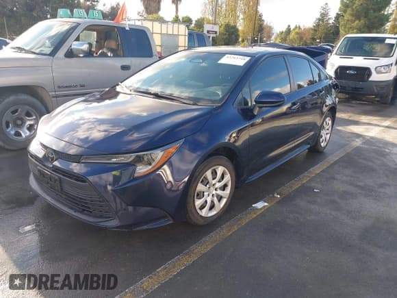 ✅ 2024 Toyota Corolla LE • VIN: JTDB4MEE2RJ015423 • Lot: 43763718. Listed on IAAI with 22,587 mi. Free auction sales archive from the USA and detailed vehicle history report at DreamBid. Image 2.