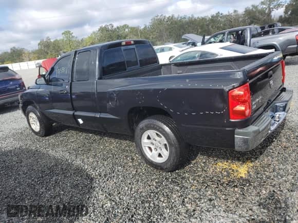 2006 Dodge Dakota SLT z VIN 1D7HE42N26S666249, wystawiony jako Copart lot #82193124 z przebiegiem 195 817 mil mil oraz Szkoda całkowita • Salvage title. Historia ofert i sprzedaży dostępna na DreamBid. Obrazek 2.