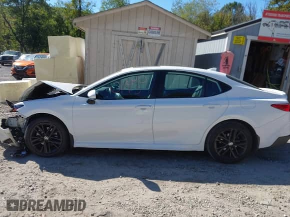2025 Toyota Camry LE with VIN 4T1DAACK2SU046289, listed as a IAAI auction lot 43340143 with 5,363 mi miles and . Bid and sale history available at DreamBid. Image 14.