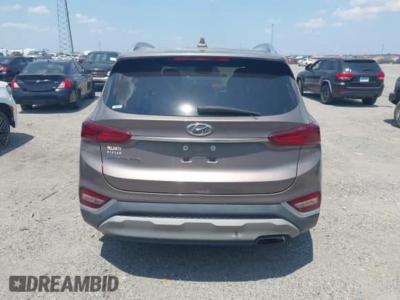 ✅ 2020 Hyundai Santa Fe SEL • VIN: 5NMS33AD3LH261307 • Lot: 42940601. Listed on IAAI with 95,444 mi. Free auction sales archive from the USA and detailed vehicle history report at DreamBid. Image 16.