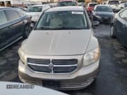 ✅ 2010 Dodge Caliber SXT • VIN: 1B3CB4HA7AD542543 • Лот: 85994744. Опубликован ранее на Copart с пробегом 60 541 миль. Бесплатный доступ к архиву аукционных продаж из США и подробный отчёт об истории автомобиля на DreamBid. Изображение 5.