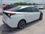 2021 Toyota Prius L Eco with VIN JTDKAMFU9M3136865, listed as a IAAI auction lot 42476212 with 16,961 mi miles and . Bid and sale history available at DreamBid. Image 4.