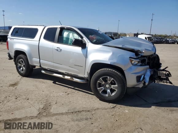 ✅ 2015 Chevrolet Colorado 4WD Z71 • VIN: 1GCHTCE37F1186881 • Лот: 84638415. Опубликован ранее на Copart с пробегом 95 793 миль. Бесплатный доступ к архиву аукционных продаж из США и подробный отчёт об истории автомобиля на DreamBid. Изображение 4.