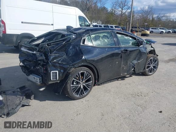 ✅ 2024 Toyota Prius LE • VIN: JTDADABU2R3020101 • Lot: 41746434. Listed on IAAI with 20,110 mi. Free auction sales archive from the USA and detailed vehicle history report at DreamBid. Image 4.