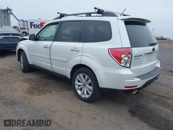 ✅ 2012 Subaru Forester X Premium • VIN: JF2SHADC8CH401203 • Lot: 42351106. Listed on IAAI with 152,122 mi. Free auction sales archive from the USA and detailed vehicle history report at DreamBid. Image 3.