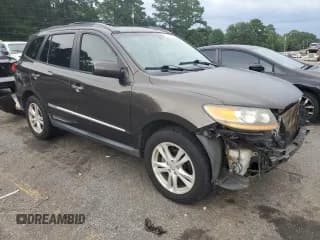 ✅ 2011 Hyundai Santa Fe Limited • VIN: 5XYZK4AG3BG047041 • Lot: 62326364. Listed on Copart with 102,081 mi. Free auction sales archive from the USA and detailed vehicle history report at DreamBid. Image 4.