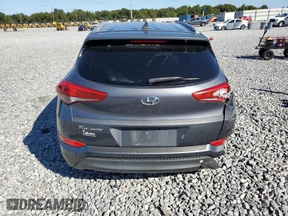 2017 Hyundai Tucson SE Plus z VIN KM8J33A46HU541889, wystawiony jako Copart lot #91064325 z przebiegiem 219 346 mil mil oraz Szkoda całkowita • Salvage title. Historia ofert i sprzedaży dostępna na DreamBid. Obrazek 6.