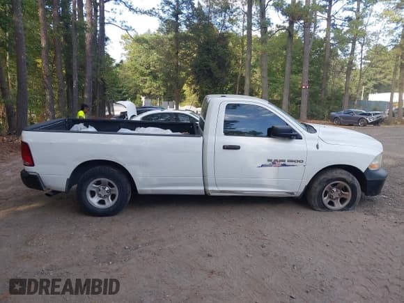 ✅ 2012 Ram 1500 ST • VIN: 3C6JD6DP0CG207224 • Lot: 43329506. Listed on IAAI with 274,825 mi. Free auction sales archive from the USA and detailed vehicle history report at DreamBid. Image 13.
