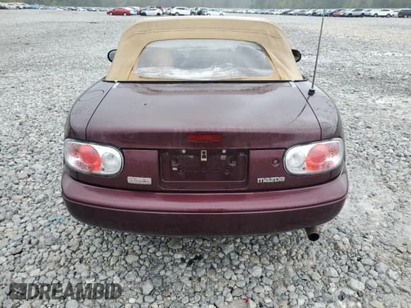 ✅ 1995 Mazda MX-5 Miata • VIN: JM1NA353XS0609672 • Lot: 85815505. Listed on Copart with 97,647 mi. Free auction sales archive from the USA and detailed vehicle history report at DreamBid. Image 6.