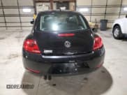 ✅ 2013 Volkswagen Beetle Fender Edition • VIN: 3VWJP7ATXDM670205 • Lot: 47687735. Listed on Copart with 97,909 mi. Free auction sales archive from the USA and detailed vehicle history report at DreamBid. Image 6.