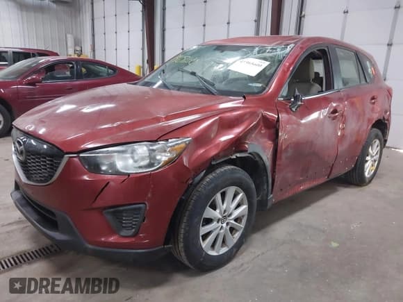 ✅ 2013 Mazda CX-5 Sport • VIN: JM3KE4BE7D0164630 • Lot: 41965600. Listed on IAAI with 157,879 mi. Free auction sales archive from the USA and detailed vehicle history report at DreamBid. Image 2.