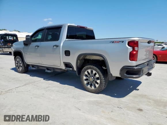 ✅ 2023 Chevrolet Silverado 2500HD Custom • VIN: 2GC4YMEY5P1717251 • Лот: 81000945. Опубликован ранее на Copart с пробегом 80 711 миль. Бесплатный доступ к архиву аукционных продаж из США и подробный отчёт об истории автомобиля на DreamBid. Изображение 2.