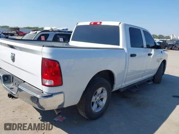 ✅ 2021 Ram 1500 Tradesman • VIN: 3C6RR6KT9MG663776 • Lot: 43423004. Listed on IAAI with 27,801 mi. Free auction sales archive from the USA and detailed vehicle history report at DreamBid. Image 4.