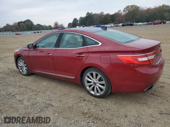 2014 Hyundai Azera Limited с VIN KMHFH4JG1EA381294, выставлен на аукционе Copart как лот 82533394 с пробегом 149 025 миль миль и Списание • Salvage title. История ставок и продаж доступна на DreamBid. Изображение 2.