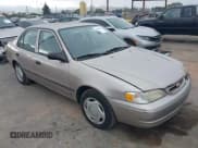 ✅ 1998 Toyota Corolla CE • VIN: 1NXBR12E7WZ076552 • Lot: 43885862. Listed on IAAI with 153,374 mi. Free auction sales archive from the USA and detailed vehicle history report at DreamBid. Image 1.