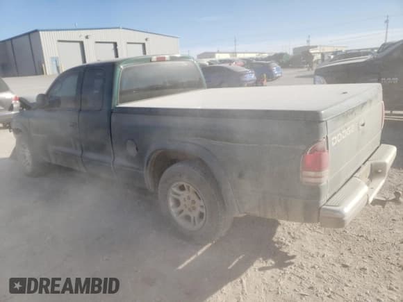 ✅ 2002 Dodge Dakota SLT • VIN: 1B7GL42N02S566740 • Lot: 82446964. Wystawiony na Copart z przebiegiem 244 432 mil. Bezpłatny archiwum sprzedaży aukcyjnych z USA i szczegółowy raport historii pojazdu na DreamBid. Zdjęcie 2.