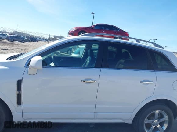 ✅ 2013 Chevrolet Captiva Sport LT • VIN: 3GNAL3EK3DS621634 • Lot: 41888913. Wystawiony na IAAI z przebiegiem 148 856 mil. Bezpłatny archiwum sprzedaży aukcyjnych z USA i szczegółowy raport historii pojazdu na DreamBid. Zdjęcie 6.