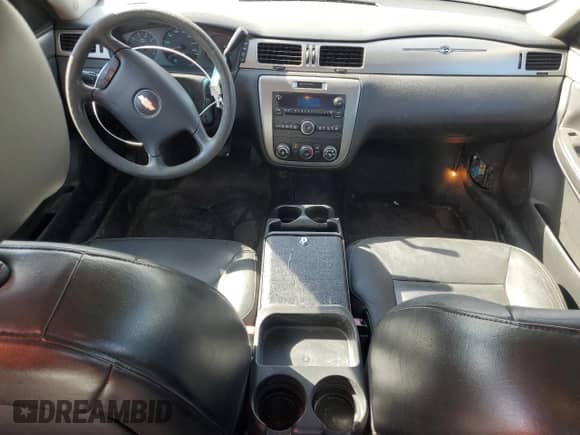 2014 Chevrolet Impala Police Police z VIN 2G1WD5E37E1152540, wystawiony jako Copart lot #52751595 z przebiegiem 145 560 mil mil oraz Czysty tytuł • Clean title. Historia ofert i sprzedaży dostępna na DreamBid. Obrazek 8.