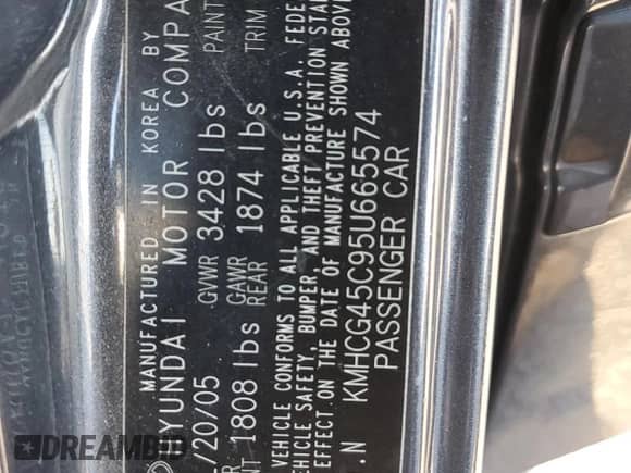 2005 Hyundai Accent GLS with VIN KMHCG45C95U665574, listed as a Copart auction lot 82603804 with 154,187 mi miles and Salvage title. Bid and sale history available at DreamBid. Image 15.