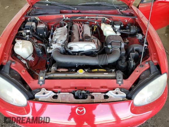 ✅ 2000 Mazda MX-5 Miata • VIN: JM1NB3532Y0142124 • Lot: 66543565. Wystawiony na Copart z przebiegiem 76 868 mil. Bezpłatny archiwum sprzedaży aukcyjnych z USA i szczegółowy raport historii pojazdu na DreamBid. Zdjęcie 11.