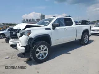 ✅ 2021 GMC Sierra 1500 Elevation • VIN: 1GTR8CEK1MZ279987 • Lot: 69600745. Listed on Copart with 64,935 mi. Free auction sales archive from the USA and detailed vehicle history report at DreamBid. Image 1.