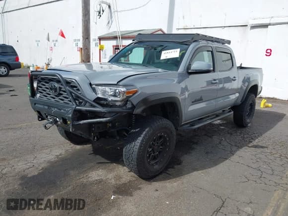 ✅ 2020 Toyota Tacoma SR5 • VIN: 3TMDZ5BN1LM097711 • Lot: 41814714. Listed on IAAI with 42,684 mi. Free auction sales archive from the USA and detailed vehicle history report at DreamBid. Image 2.