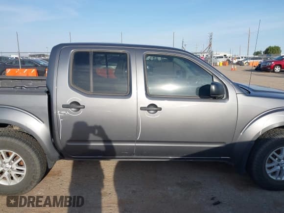 ✅ 2021 Nissan Frontier SV • VIN: 1N6ED0EB2MN702654 • Лот: 42227414. Опубликован ранее на IAAI с пробегом 142 309 миль. Бесплатный доступ к архиву аукционных продаж из США и подробный отчёт об истории автомобиля на DreamBid. Изображение 14.
