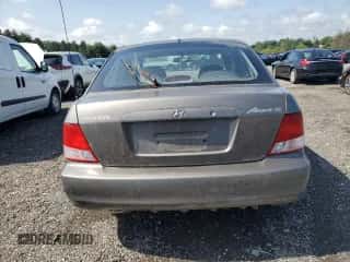 2001 Hyundai Accent GS with VIN KMHCG35C91U131429, listed as a Copart auction lot 65850374 with 46,282 mi miles and Clean title. Bid and sale history available at DreamBid. Image 6.