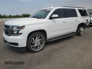 ✅ 2020 Chevrolet Suburban LS • VIN: 1GNSCGEC0LR225957 • Lot: 64193324. Wystawiony na Copart z przebiegiem 82 347 mil. Bezpłatny archiwum sprzedaży aukcyjnych z USA i szczegółowy raport historii pojazdu na DreamBid. Zdjęcie 1.