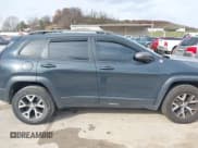 ✅ 2016 Jeep Cherokee Trailhawk • VIN: 1C4PJMBS7GW183731 • Lot: 43584556. Listed on IAAI with 123,183 mi. Free auction sales archive from the USA and detailed vehicle history report at DreamBid. Image 13.