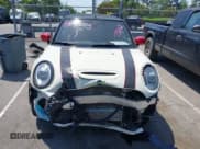 ✅ 2021 MINI Convertible • VIN: WMWWJ9C0XM3M07302 • Lot: 42027854. Listed on IAAI with 30,921 mi. Free auction sales archive from the USA and detailed vehicle history report at DreamBid. Image 12.