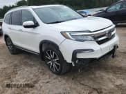 ✅ 2019 Honda Pilot Touring 8-Passenger • VIN: 5FNYF5H91KB018111 • Lot: 71864465. Listed on Copart with 96,937 mi. Free auction sales archive from the USA and detailed vehicle history report at DreamBid. Image 15.