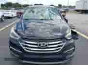 2018 Hyundai Santa Fe 2.4L z VIN 5XYZT3LB3JG541357, wystawiony jako IAAI lot #43481395 z przebiegiem 99 707 mil mil oraz . Historia ofert i sprzedaży dostępna na DreamBid. Obrazek 13.