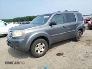2011 Honda Pilot LX with VIN 5FNYF4H26BB014018, listed as a Copart auction lot 51043965 with 291,992 mi miles and Clean title. Bid and sale history available at DreamBid. Image 1.