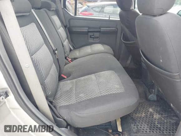 ✅ 2005 Ford Explorer Sport Trac XLS • VIN: 1FMZU77K85UA70272 • Лот: 43083516. Опубликован ранее на IAAI с пробегом 201 661 миль. Бесплатный доступ к архиву аукционных продаж из США и подробный отчёт об истории автомобиля на DreamBid. Изображение 8.