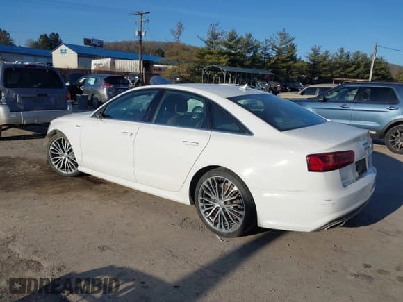 ✅ 2016 Audi A6 Prestige • VIN: WAUHGAFC2GN003319 • Lot: 41758455. Wystawiony na IAAI z przebiegiem 162 061 mil. Bezpłatny archiwum sprzedaży aukcyjnych z USA i szczegółowy raport historii pojazdu na DreamBid. Zdjęcie 3.