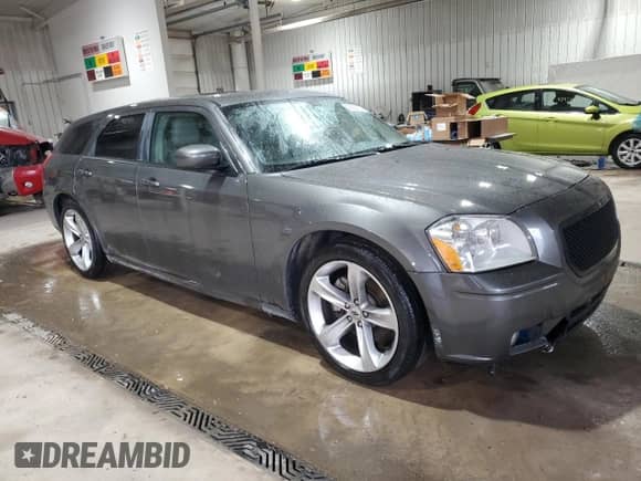 2005 Dodge Magnum RT с VIN 2D4GV58245H625199, выставлен на аукционе Copart как лот 43923275 с пробегом 126 647 миль миль и Списание • Salvage title. История ставок и продаж доступна на DreamBid. Изображение 4.