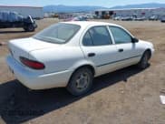 ✅ 1996 Geo Prizm LSi • VIN: 1Y1SK5262TZ064943 • Lot: 42738867. Listed on IAAI with 216,954 mi. Free auction sales archive from the USA and detailed vehicle history report at DreamBid. Image 4.