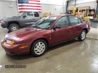 2002 Saturn SL с VIN 1G8ZK54702Z124798, выставлен на аукционе Copart как лот 63276955 с пробегом 149 728 миль миль и Чистый • Clean title. История ставок и продаж доступна на DreamBid. Изображение 1.
