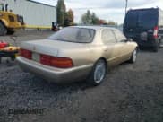 ✅ 1993 Lexus LS • VIN: JT8UF11E5P0163977 • Лот: 82678465. Опубликован ранее на Copart с пробегом 109 695 миль. Бесплатный доступ к архиву аукционных продаж из США и подробный отчёт об истории автомобиля на DreamBid. Изображение 3.