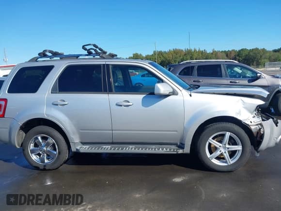 ✅ 2011 Ford Escape Limited • VIN: 1FMCU9EG7BKA54409 • Lot: 43380194. Listed on IAAI with 225,235 mi. Free auction sales archive from the USA and detailed vehicle history report at DreamBid. Image 13.