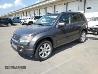 ✅ 2012 Suzuki Grand Vitara Limited • VIN: JS3TE0D75C4100079 • Lot: 68521615. Listed on Copart with 52,045 mi. Free auction sales archive from the USA and detailed vehicle history report at DreamBid. Image 1.