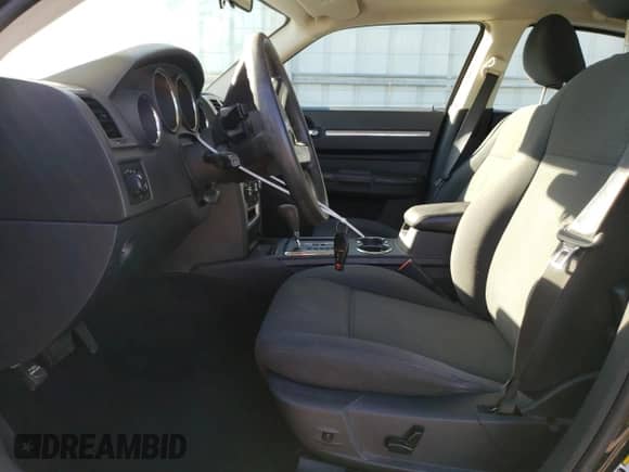 2010 Dodge Charger SXT с VIN 2B3CA3CV7AH148812, выставлен на аукционе Copart как лот 72450134 с пробегом 187 112 миль миль и Списание • Salvage title. История ставок и продаж доступна на DreamBid. Изображение 7.