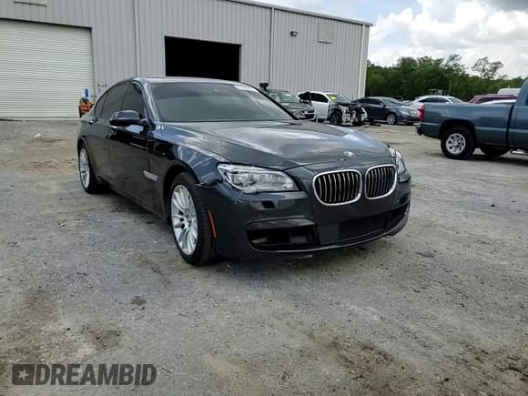✅ 2015 BMW 7 Series 750i • VIN: WBAYA8C54FD825401 • Lot: 67568435. Listed on Copart with 139,594 mi. Free auction sales archive from the USA and detailed vehicle history report at DreamBid. Image 13.