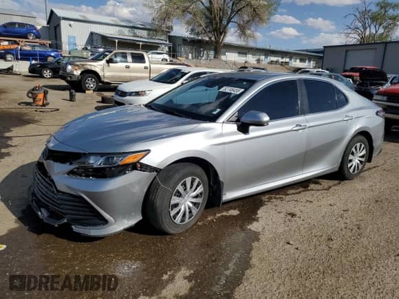 2022 Toyota Camry Hybrid LE с VIN 4T1C31AK9NU596263, выставлен на аукционе Copart как лот 52746455 с пробегом 52 529 миль миль и Списание • Salvage title. История ставок и продаж доступна на DreamBid. Изображение 1.