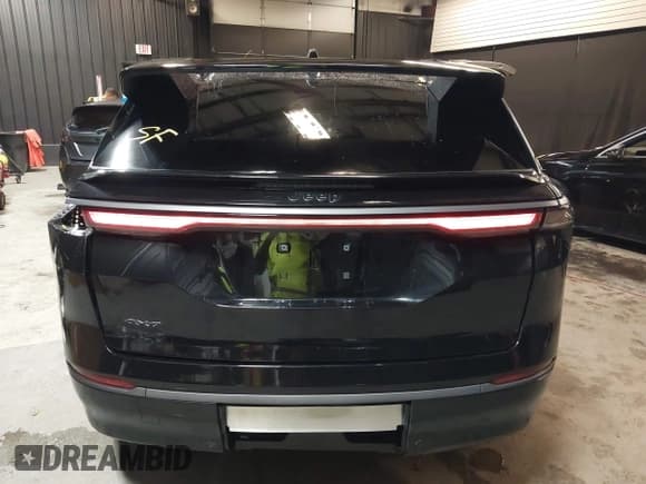 ✅ 2025 Jeep Wagoneer S Limited • VIN: 3C4RJNCK1ST572683 • Lot: 43396783. Listed on IAAI with 2,634 mi. Free auction sales archive from the USA and detailed vehicle history report at DreamBid. Image 17.